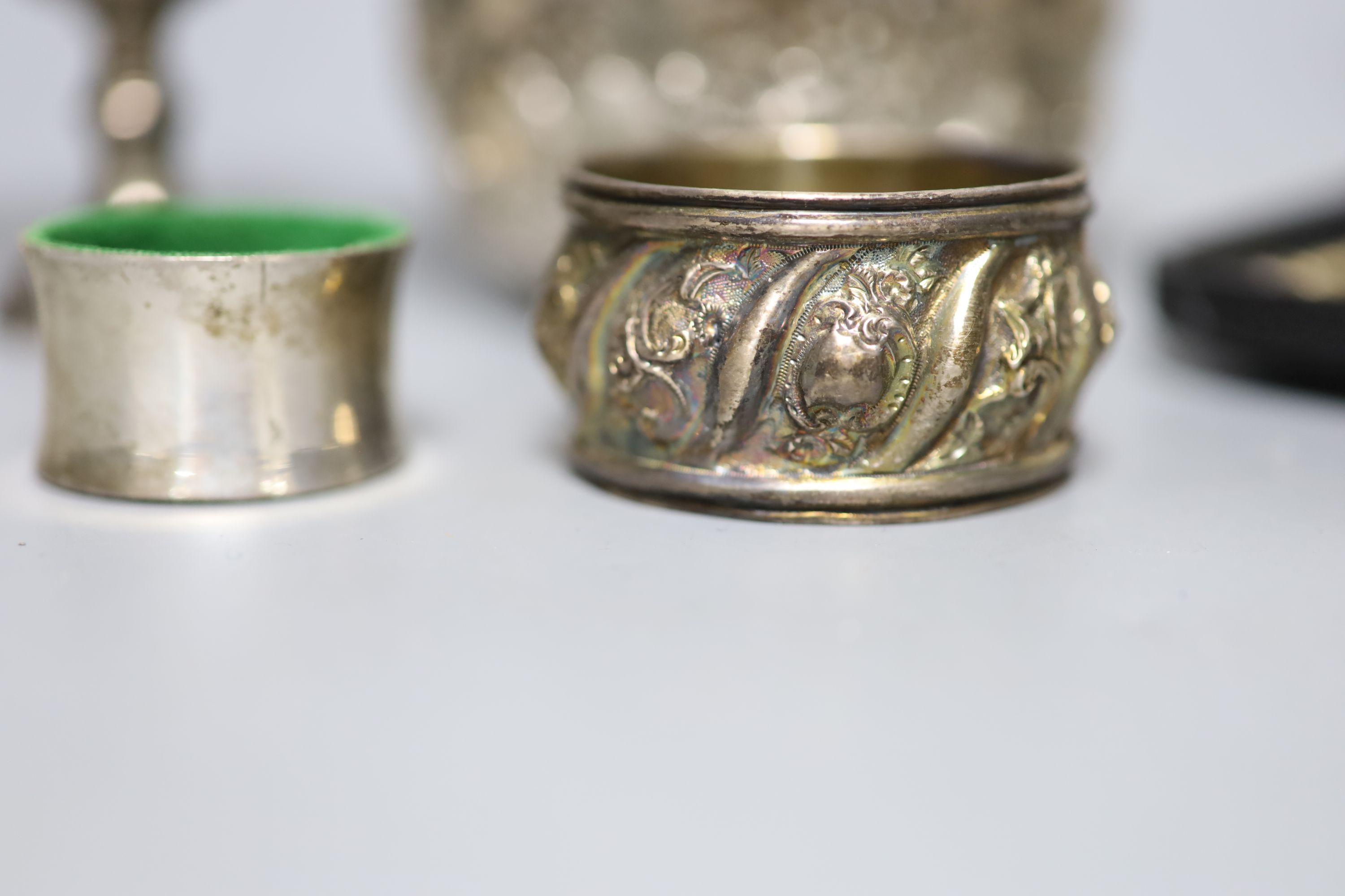 A cased set of six late 19th century Russian 84 zolotnik and niello teaspoons, three sterling kiddush cups, a French white metal napkin ring, a small sterling napkin ring and an Indian white metal bowl.